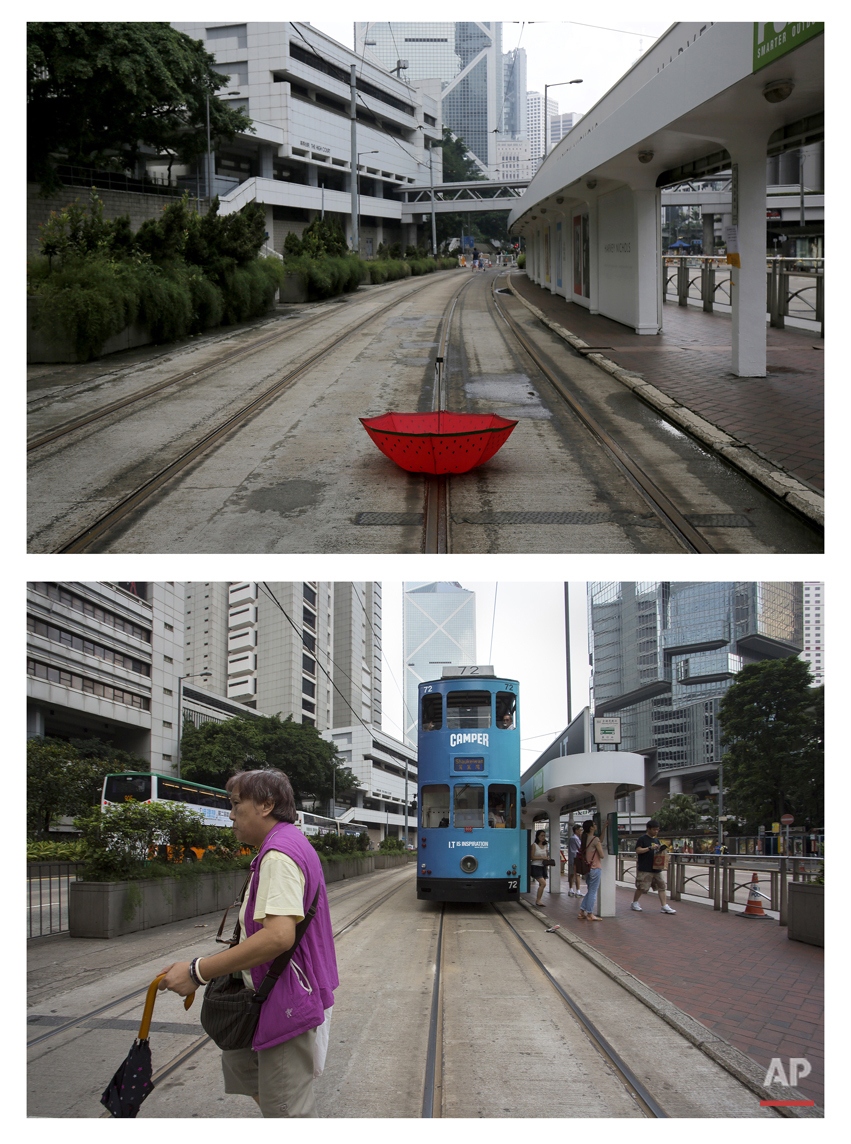  This combination of Oct. 4, 2014 file and Sept. 26, 2015 photos shows an umbrella sitting on a deserted tram track upside down at a rally outside the government headquarters during the Umbrella Movement in Hong Kong and a woman walking past a tram a