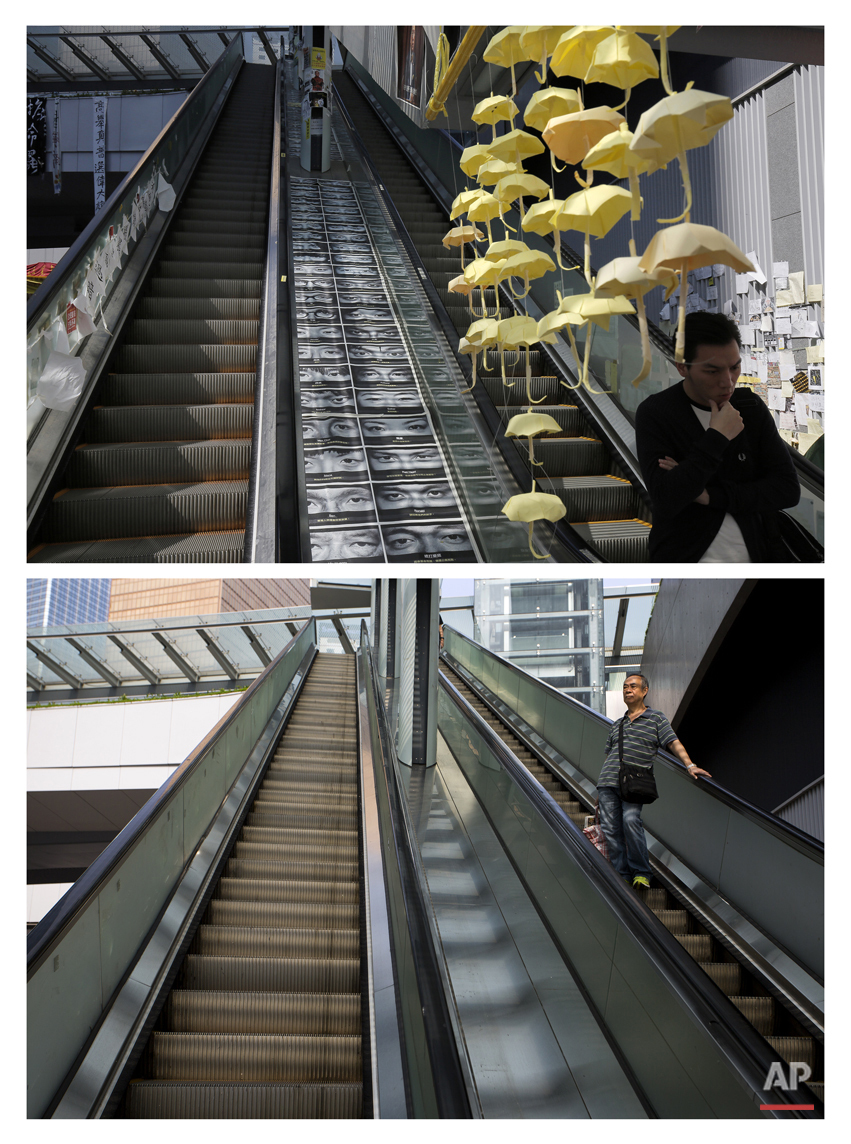  This combination of Nov. 21, 2014 file, top, and Sept. 26, 2015 photos shows a man walking past yellow paper umbrellas hanging above an escalator in an area occupied by protesters outside government headquarters during the Umbrella Movement in Hong 
