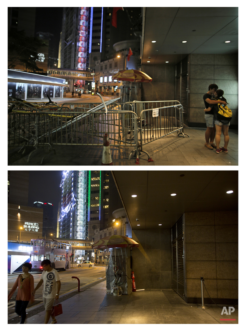  This combination of Oct. 1, 2014 file, top, and Sept. 26, 2015 photos shows two students kissing next to barricades in the central business district during the Umbrella Movement in Hong Kong, and a couple walking past the same place almost a year la