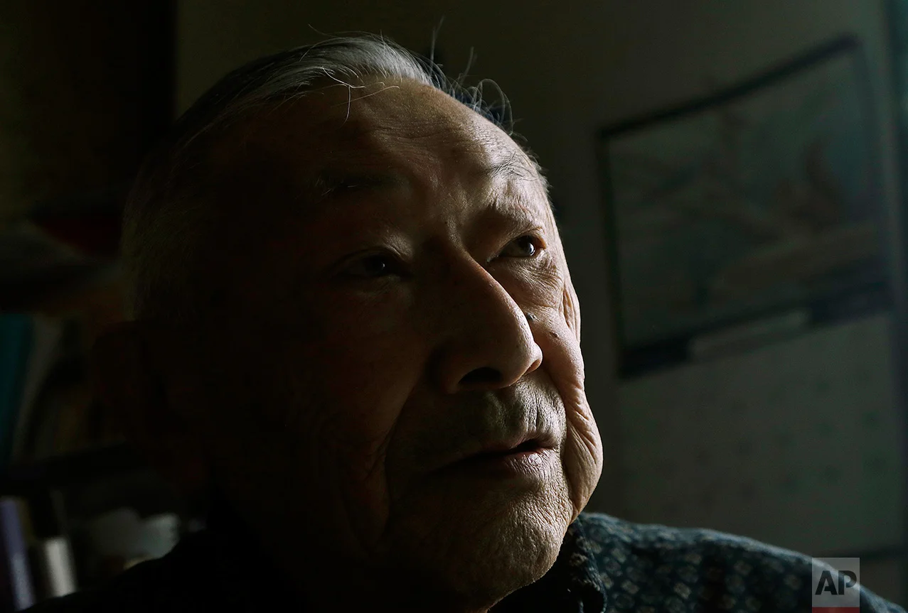 In this Feb. 10, 2017 photo, Hiroshi Kashiwagi speaks during an interview at his home in San Francisco. Kashiwagi was 19 when his family was ordered from their home in Northern California’s Placer County and to a temporary detention center during World War II. (AP Photo/Jeff Chiu)