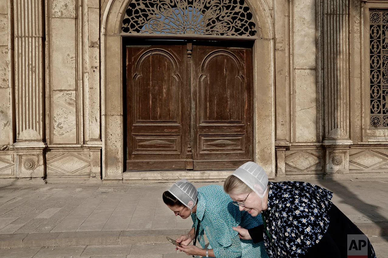  American tourists from Washington laugh as they visit the Citadel of Salah al-Din, a preserved medieval site, and one of the most important landmarks in Cairo, Egypt, Sunday, Feb. 19, 2017. (AP Photo/Nariman El-Mofty) 