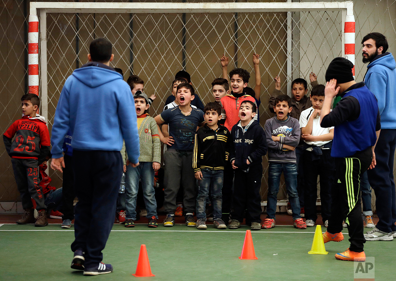  Syrian refugee boys scream as they attend a soccer training session at a private sports club, southern Beirut, Lebanon on Sunday, Feb. 19, 2017. Every Sunday the gymnasium in Beirut echoes with the shouting and laughter of dozens of children, mostly