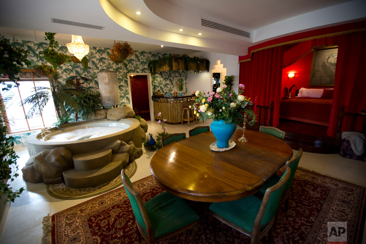  The presidential suite of the The Walled Off Hotel" in the West Bank city of Bethlehem, Friday, March 3, 2017. The owner of a guest house packed with the elusive artist Banksy's work has opened the doors of his West Bank establishments to media, sho