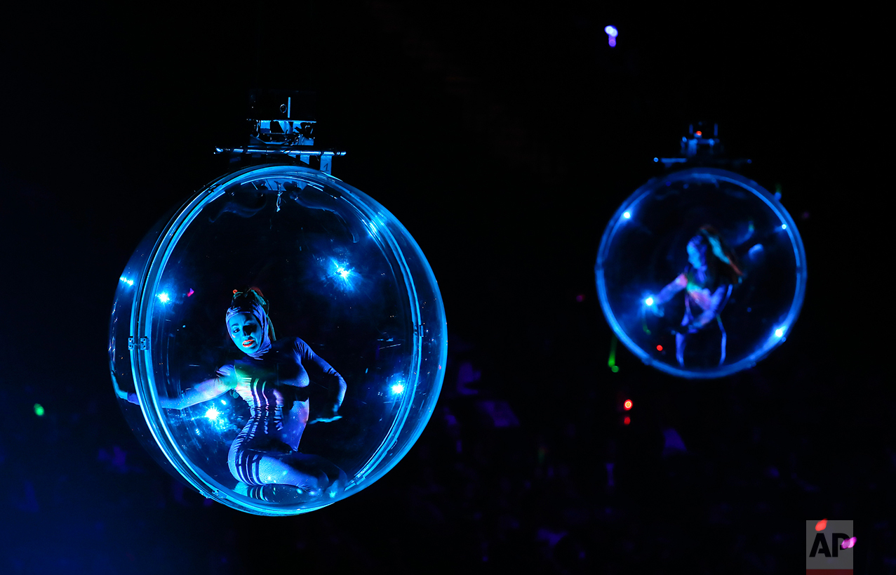  Acrobats perform in transparent balls hung from the rafters during the opening night show of the Ringling Bros. and Barnum & Bailey Circus, Thursday, Feb. 23, 2017, in New York. (AP Photo/Julie Jacobson) 