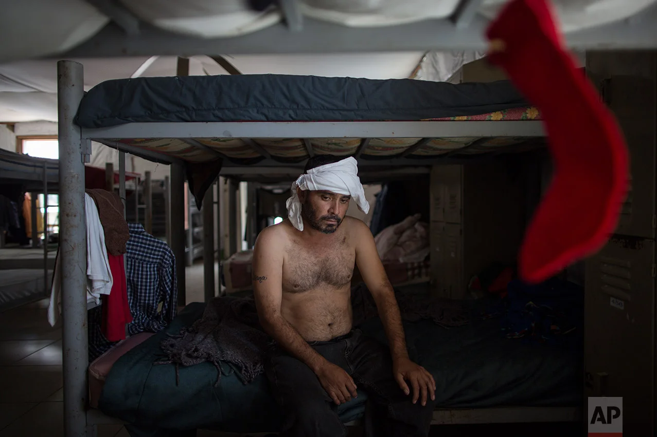 Delfino Luis Trevino rests while waiting to have lunch at the "Senda de Vida" migrant shelter in Reynosa, Mexico, Wednesday, March, 22, 2017. (AP Photo/Rodrigo Abd) 