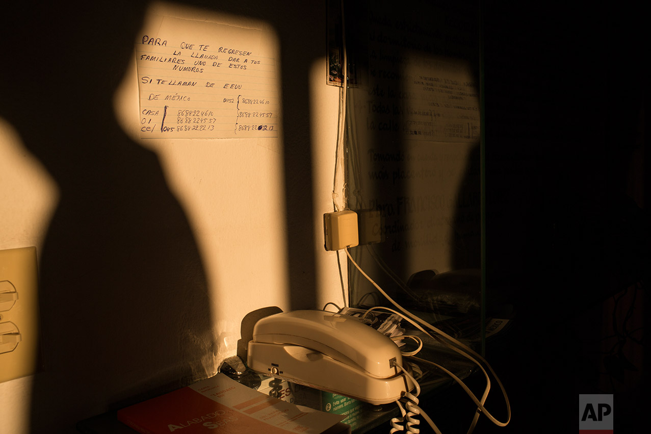 A phone used by migrants to talk to their love ones is seen in the house of the migrant in Matamoros, Tamaulipas, Mexico, Wednesday, March, 22, 2017. (AP Photo/Rodrigo Abd)