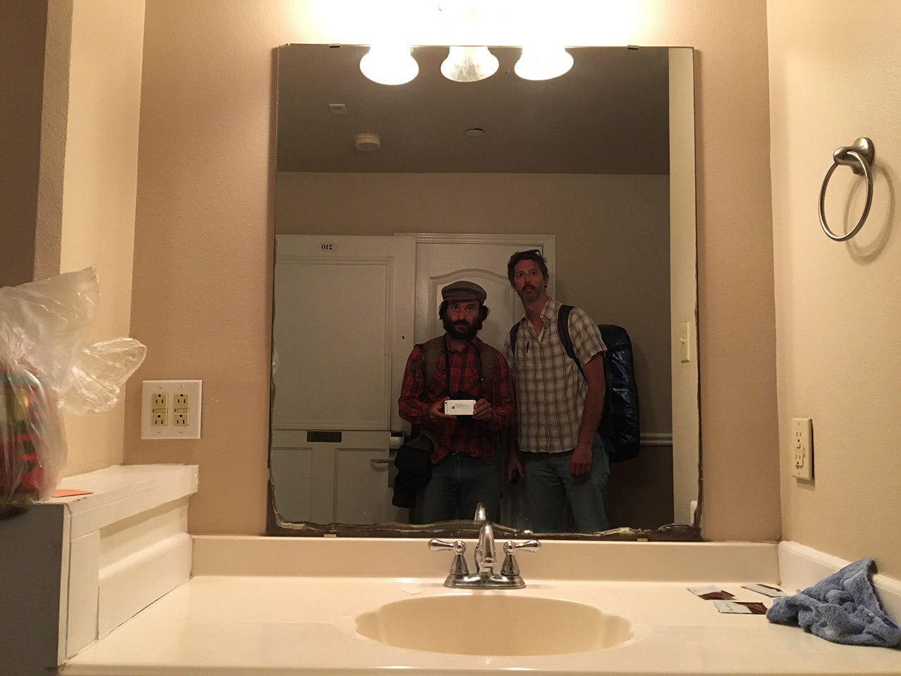  AP photographer Rodrigo Abd, left, and writer Christopher Sherman pose for a selfie inside their hotel room, March 24, 2017, Laredo, Texas. (AP Photo/Rodrigo Abd) 