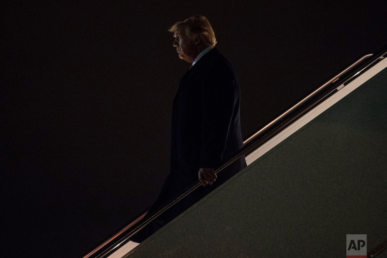 President Donald Trump arrives at Andrews Air Force Base, Md., Monday, March 20, 2017, to board Marine One for a short trip to the White House. Trump spoke at a rally in Louisville, Ky., on Monday. (AP Photo/Andrew Harnik)