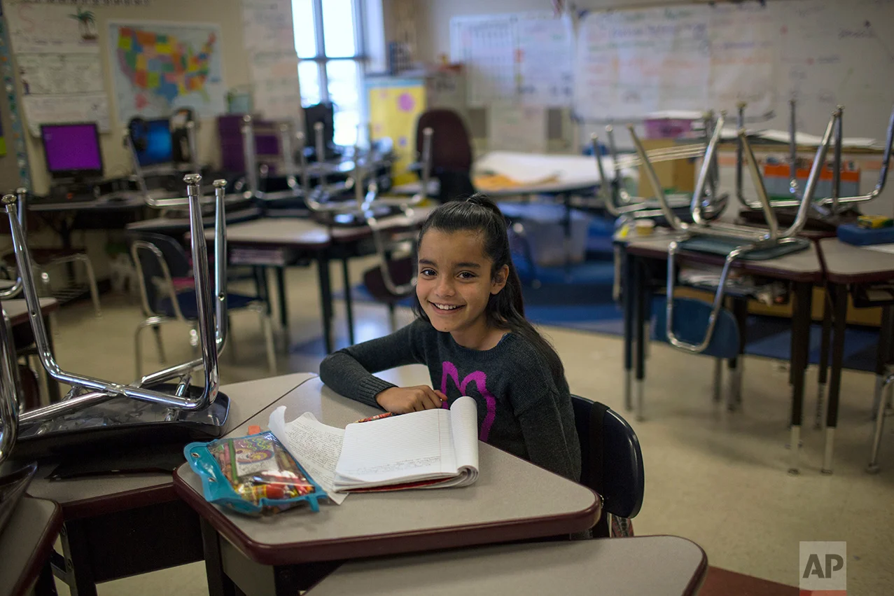 A student sits at her desk in a classroom at Columbus Elementary School, in Columbus, New Mexico, US, Friday, March 31, 2017. (AP Photo/Rodrigo Abd)