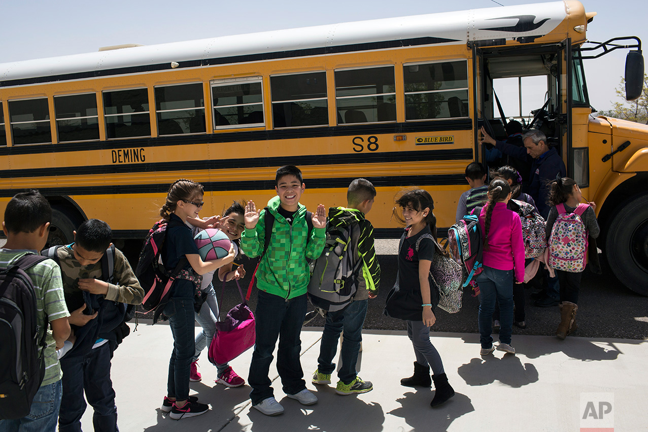  Students board a school bus home at Columbus Elementary School, in Columbus, New Mexico, US, Friday, March 31, 2017. (AP Photo/Rodrigo Abd) 