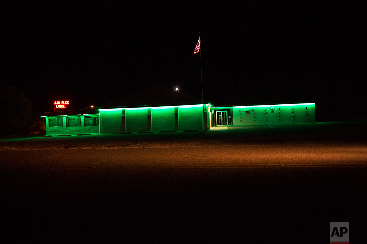  The Elks Lodge is illuminated in Ajo, Arizona, Monday night, April 3, 2017. (AP Photo/Rodrigo Abd) 