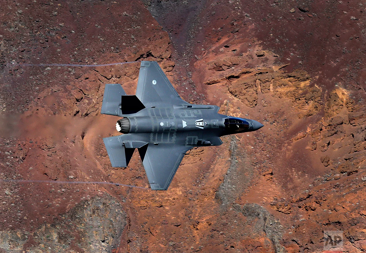 In this Feb. 28, 2017, photo, a Lockheed Martin F-35A Lighting II from the 323 Squadron, Royal Netherlands Air Force flies through the nicknamed Star Wars Canyon on the Jedi transition in Death Valley National Park, Calif. (AP Photo/Ben Margot)