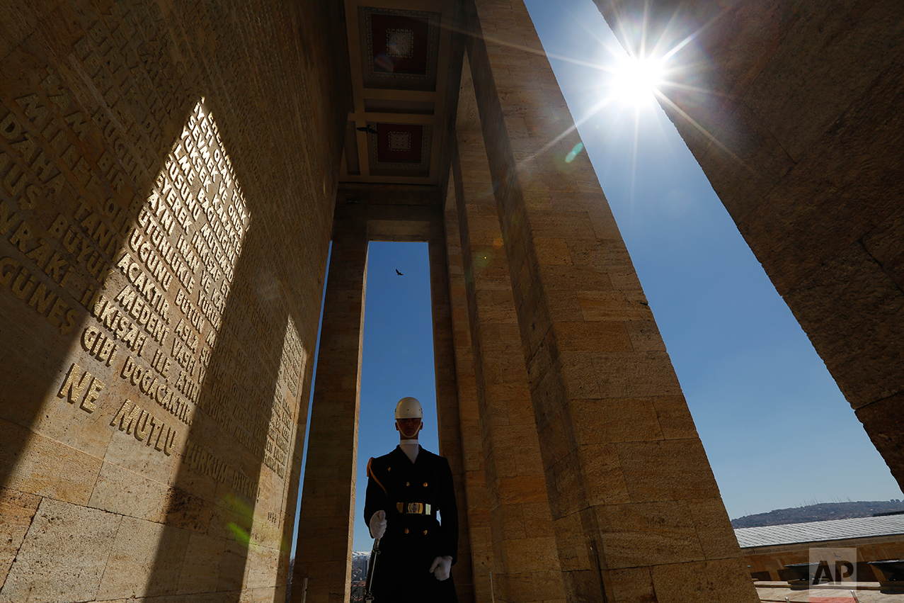 In this March 29, 2017 photo, a Turkish military officer stands as an honour guard outside the mausoleum of Mustafa Kemal Ataturk, the founder of modern Turkey in Ankara, Turkey. Ataturk' mausoleum, a sprawling complex built in the early 1950s in the Turkish capital, is still a place of pilgrimage for many. Families, schoolchildren, elderly people, veiled Muslim women all come to pay homage to his memory. (AP Photo/Lefteris Pitarakis)