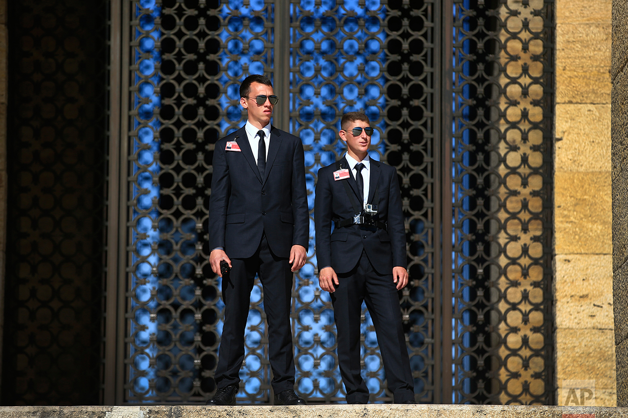 In this March 29, 2017 photo, Turkish military officers provide security outside the mausoleum of Mustafa Kemal Ataturk, the founder of modern Turkey in Ankara, Turkey. For generations, Turks have revered their nation’s founding father, Mustafa Kemal Ataturk, who carved out modern Turkey from the ashes of the Ottoman Empire in the wake of World War I, and his mausoleum in Ankara is a place of pilgrimage for many. (AP Photo/Lefteris Pitarakis)