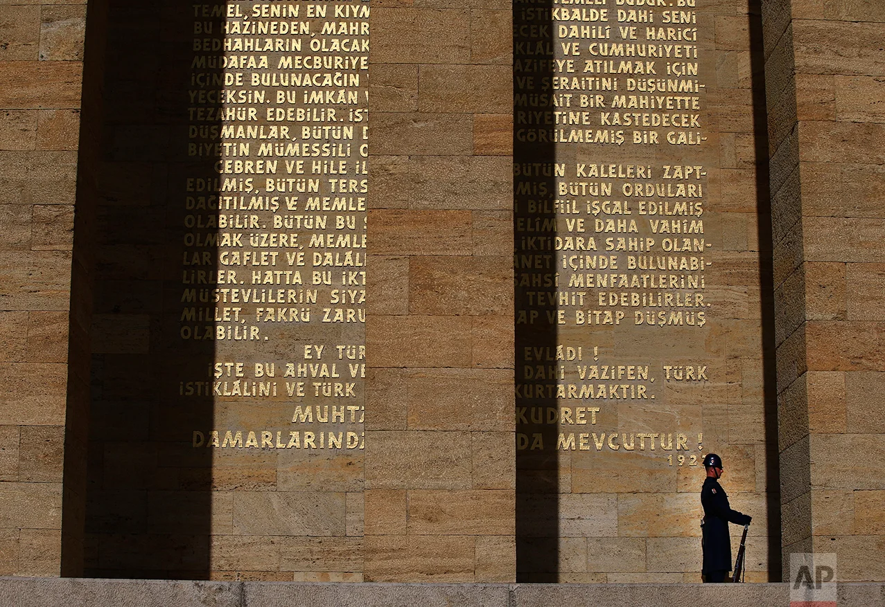 In this March 29, 2017 photo, a Turkish military officer stands as an honour guard outside the mausoleum of Mustafa Kemal Ataturk, the founder of modern Turkey in Ankara, Turkey. For generations, Turks have revered their nation’s founding father, Mustafa Kemal Ataturk, who carved out modern Turkey from the ashes of the Ottoman Empire in the wake of World War I, and his mausoleum in Ankara is a place of pilgrimage for many. (AP Photo/Lefteris Pitarakis)