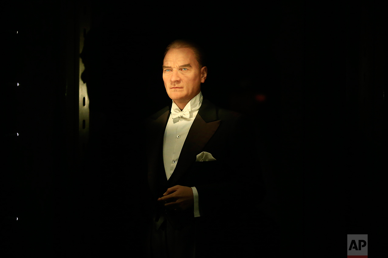 In this March 29, 2017 photo, a wax figure of Mustafa Kemal Ataturk, the founder of modern Turkey is exhibited at the museum adjacent to his mausoleum in Ankara, Turkey. The legacy of the man whose surname means "father of Turks" was one of a modern, secular, western-leaning Turkey. For generations, Turks have revered Ataturk, who carved out modern Turkey from the ashes of the Ottoman Empire in the wake of World War I. (AP Photo/Lefteris Pitarakis)