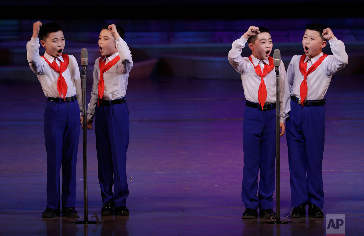 Schoolboys sing at the Mangyongdae Children's Palace on Friday, April 14, 2017, in Pyongyang, North Korea. Amid rising regional tensions, Pyongyang residents have been preparing for North Korea's most important holiday: the 105th birth anniversary of Kim Il Sung, the country's late founder and grandfather of current ruler Kim Jong Un. (AP Photo/Wong Maye-E)