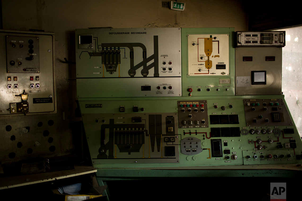 This Tuesday April 4, 2017 photo shows the main control panel of a former steel factory abandoned inside an industrial unit at Hayange, a commune in the Moselle department in Grand East in north-eastern France. (AP Photo/Emilio Morenatti)