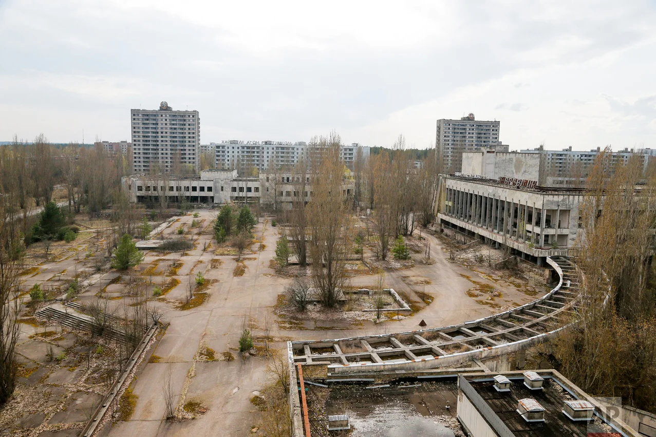 This photo taken Wednesday, April 5, 2017, shows a central square in the deserted town of Pripyat, some 3 kilometers (1.86 miles) from the Chernobyl nuclear power plant Ukraine. (AP Photo/Efrem Lukatsky)