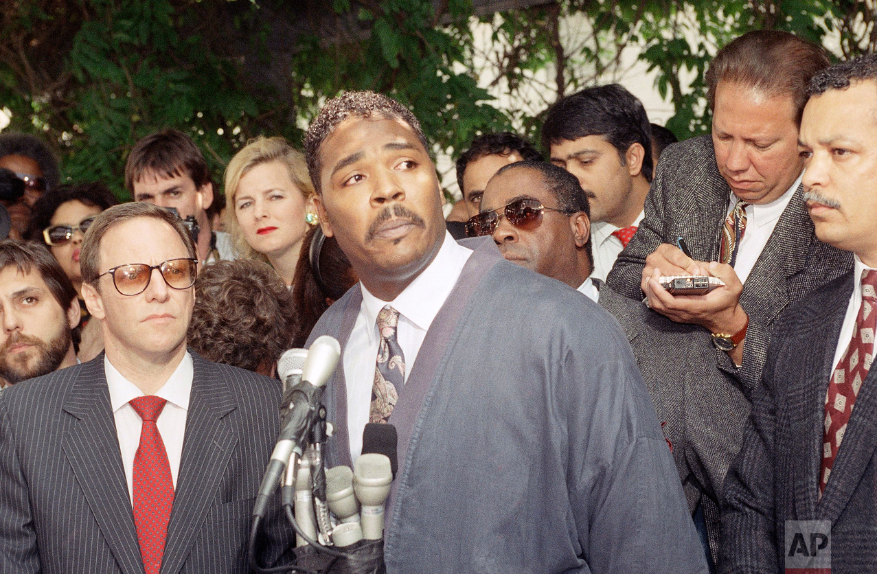 Rodney King makes a statement at a Los Angeles press conference, May 1, 1992, pleading for the end to the rioting and looting that has plagued the city following the verdicts in the trial against four Los Angeles Police officers accused of beating him. It was King's first public appearance since last year. (AP Photo/David Longstreath)