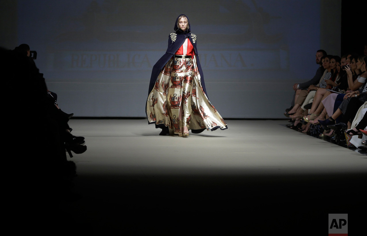 A model wears a creation from the Ani Alvarez Calderon autumn/winter collection during Fashion Week in Lima, Peru, Tuesday, April 25, 2017. (AP Photo/Martin Mejia)