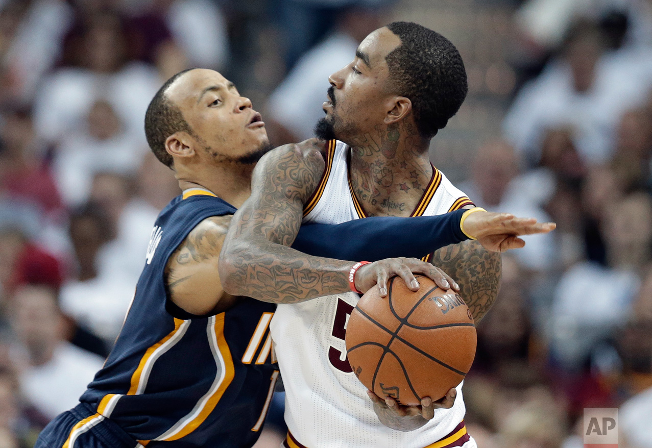  Indiana Pacers' Monta Ellis, left, puts pressure on Cleveland Cavaliers' J.R. Smith during the second half in Game 1 of a first-round NBA basketball playoff series, Saturday, April 15, 2017, in Cleveland. The Cavaliers won 109-108. (AP Photo/Tony De
