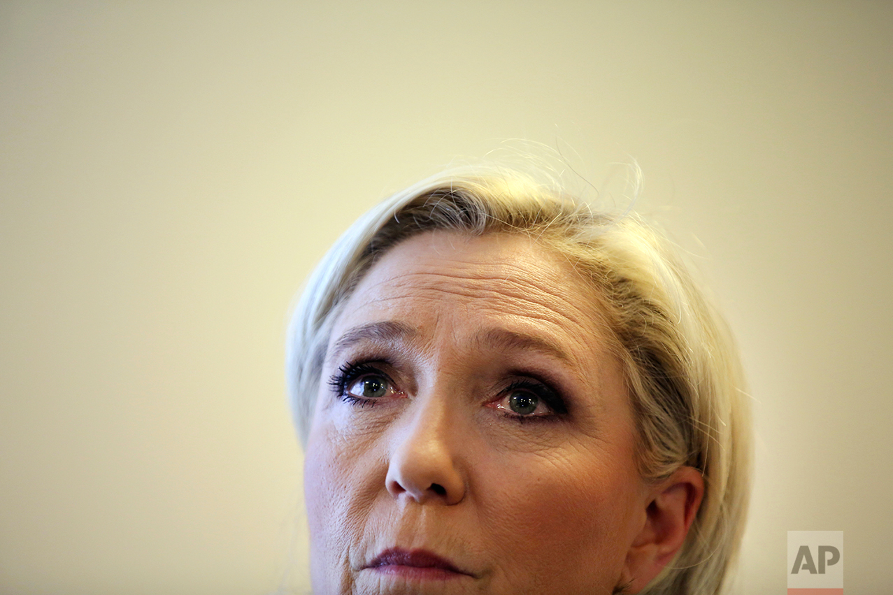  French far-right presidential candidate Marine Le Pen delivers a speech during a conference on Africa-France relationships, in Paris, Tuesday, May 2, 2017. (AP Photo/Thibault Camus) 