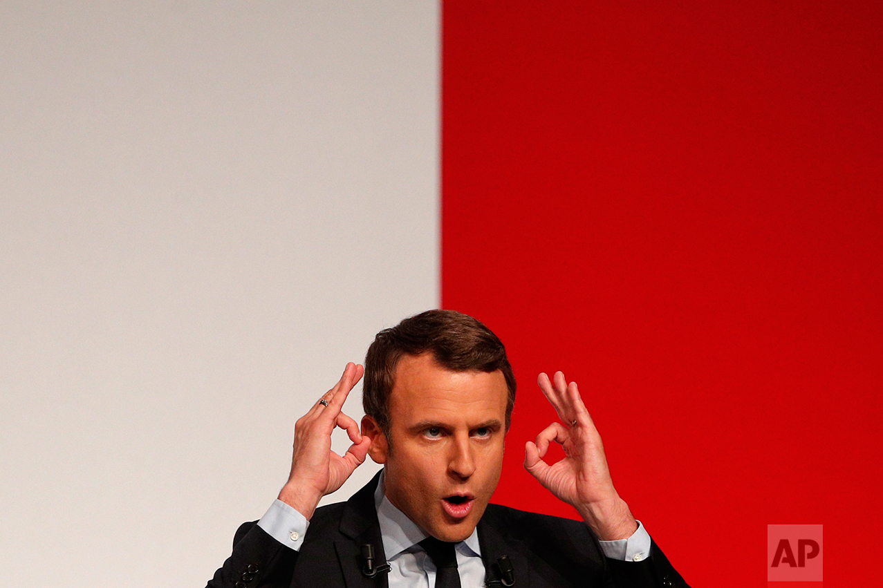  French centrist presidential candidate Emmanuel Macron delivers a speech during a campaign rally in Chatellerault, central France, Friday, April 28, 2017. (AP Photo/Christophe Ena) 