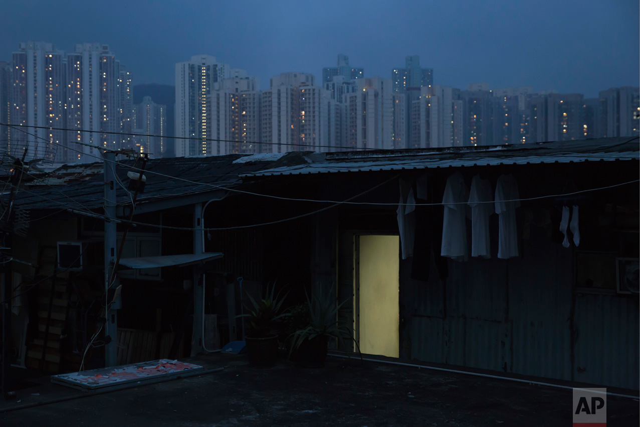  In this Saturday, May 6, 2017 photo, an illegal rooftop hut is seen in Hong Kong.  There’s a dark side to the property boom in wealthy Hong Kong, where hundreds of thousands of people priced out of the market must live in partitioned apartments, “co