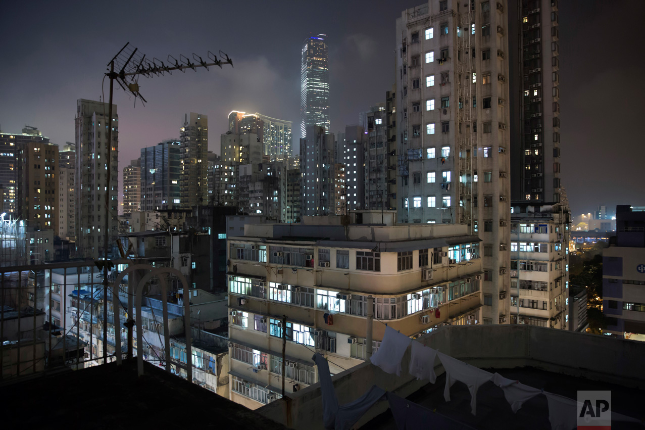  This May 6, 2017 photo shows a general view of residential and commercial buildings in Yau Tsim Mong District, a popular location for the "subdivided units" in Hong Kong. There’s a dark side to the property boom in wealthy Hong Kong, where hundreds 