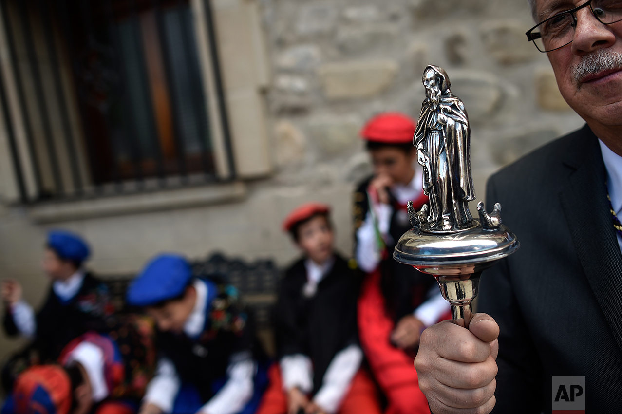  Raul Barquin carries a baton with the religious figure of the Domingo de La Calzada Saint before the '"Prioress Procession", the ceremony in honor of Domingo de La Calzada Saint (1019-1109), who helped poor people and pilgrims, in Santo Domingo de L