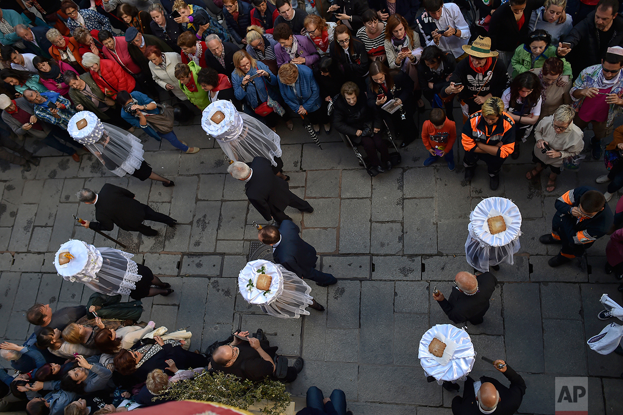  Participants of the "Prioress Procession" take part in the ceremony in honor of Domingo de La Calzada Saint (1019-1109), who helped poor people and pilgrims, in Santo Domingo de La Calzada, northern Spain, Wednesday, May 10, 2017. (AP Photo/Alvaro B