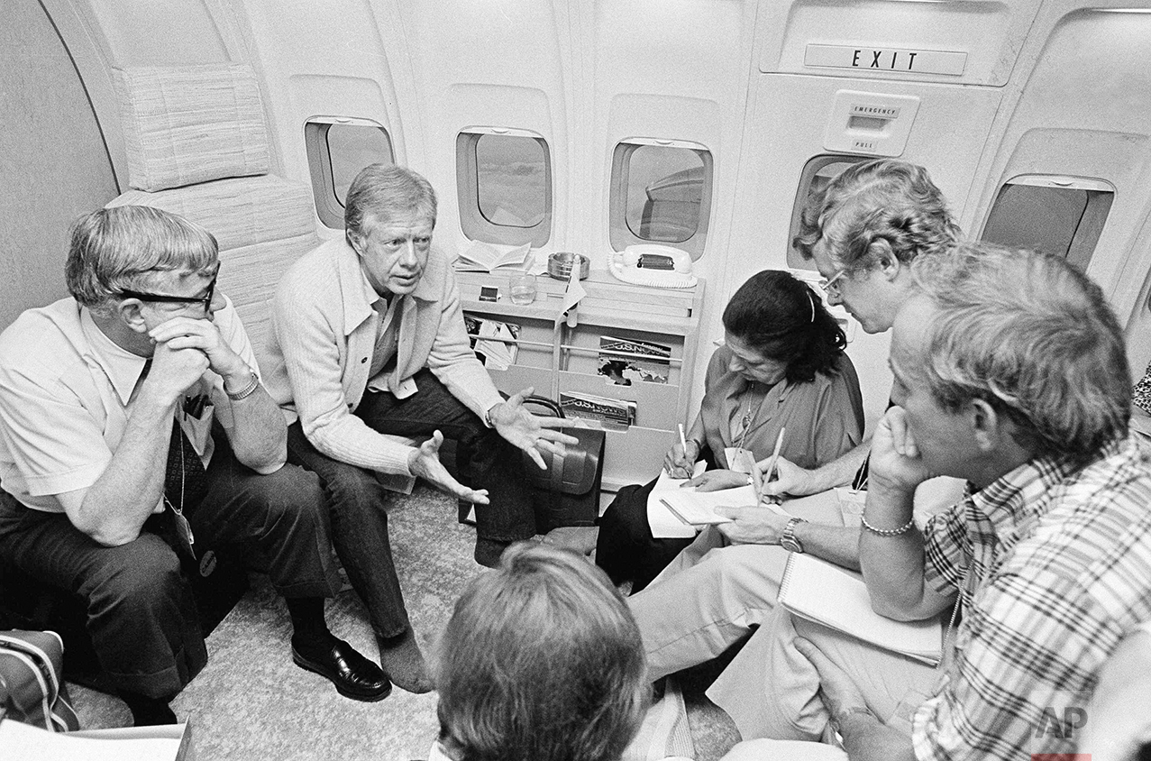  President Jimmy Carter meets with newsmen aboard Air Force One on July 1, 1979, while flying from Seoul, South Korea, to Honolulu. Carter said as a result of the OPEC increase in the price of oil he feels the country is due for a recession with a ma