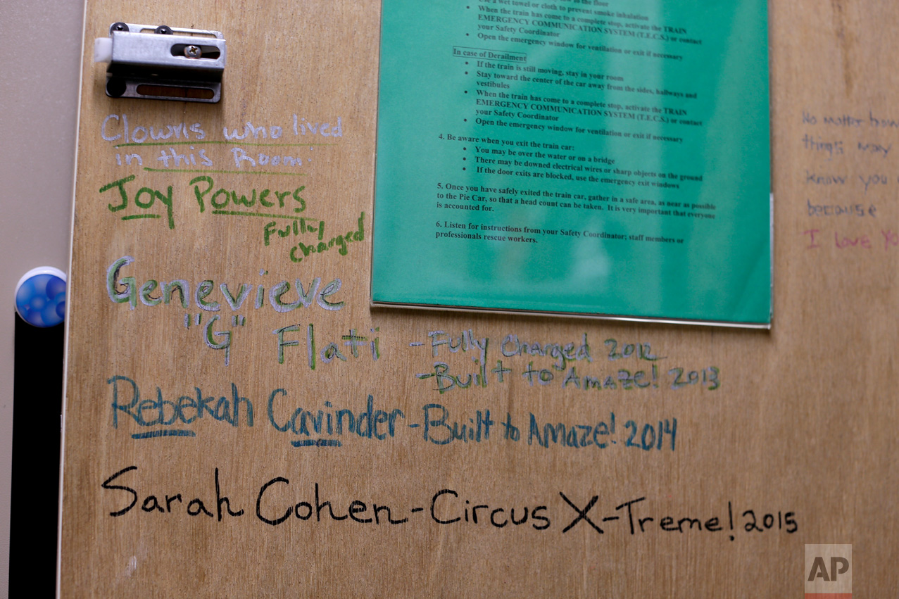  A cabinet door inside a clown's living quarters on the train displays messages and signatures from past clowns who have lived in that room, Thursday, May 4, 2017, in Providence, R.I. "The Greatest Show on Earth" is about to put on its last show on e