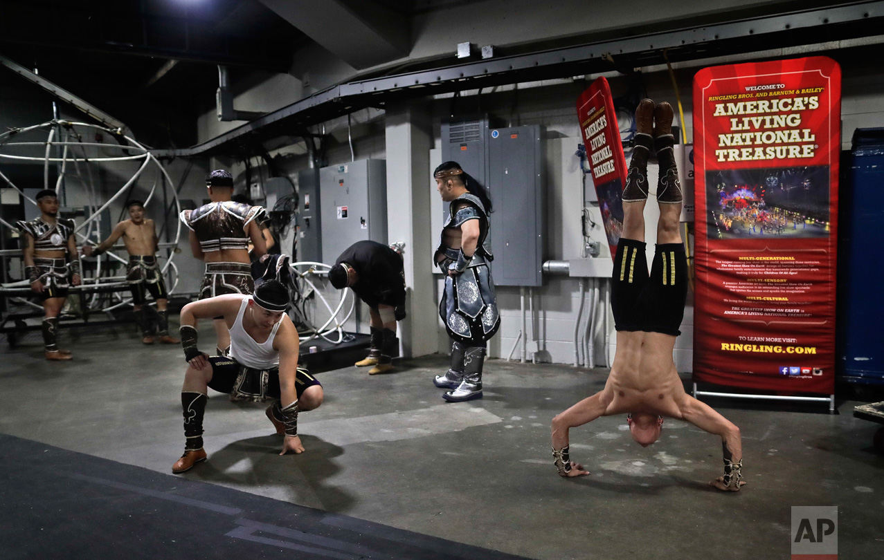  Members of the Ringling Bros. Circus Mongolian Marvels warm up backstage before performing, Friday, May 5, 2017, in Providence, R.I. "The Greatest Show on Earth" is about to put on its last show on earth. For the performers who travel with the Ringl
