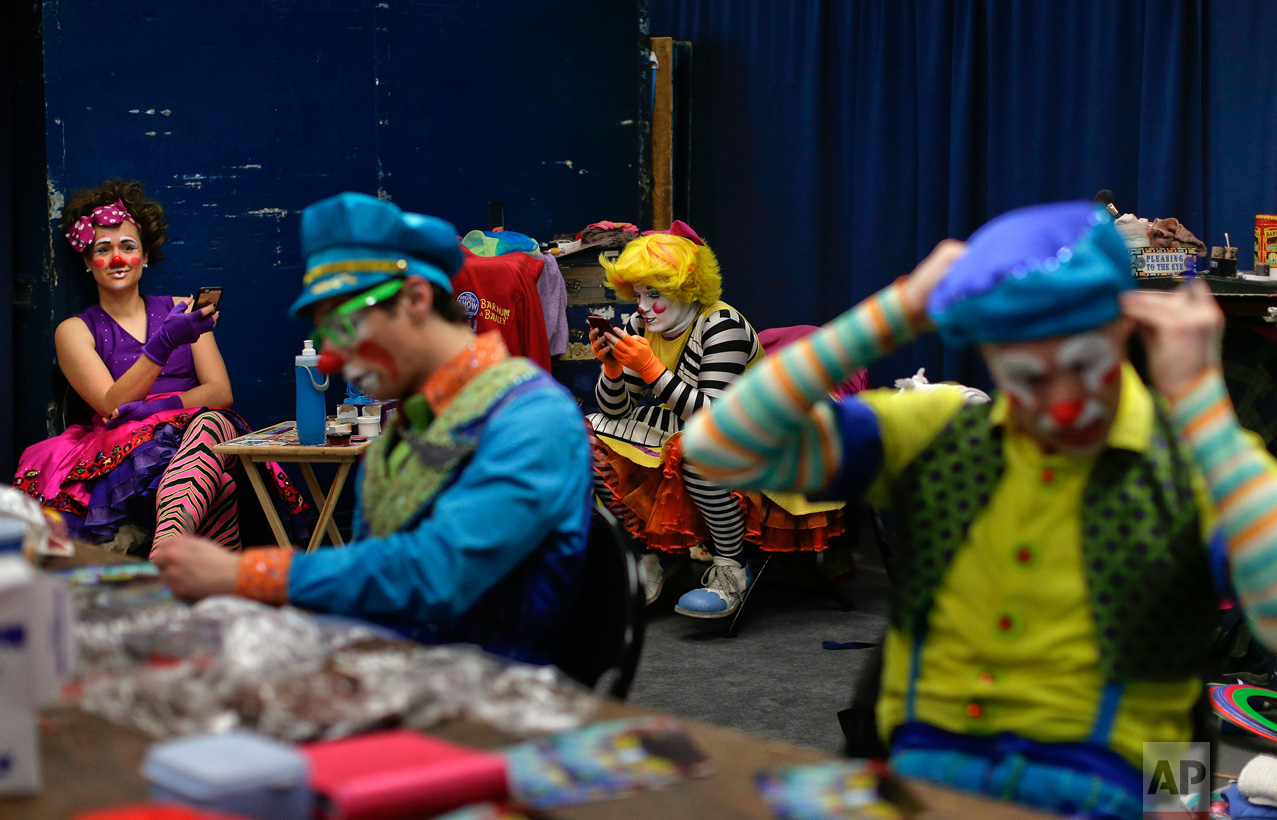  Ringling Bros. clowns take a break between acts in "Clown Alley," a private area backstage, Friday, May 5, 2017, in Providence, R.I. Clown Alley is not just a place: the private area backstage where clowns get ready to perform. It’s how the clowns r