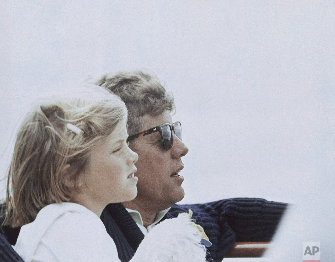  In this photo provided by the White House, President John F. Kennedy is shown with his daughter Caroline in Hyannis Port, Mass., Aug. 25, 1963. (AP Photo/White House/Cecil Stockton) 