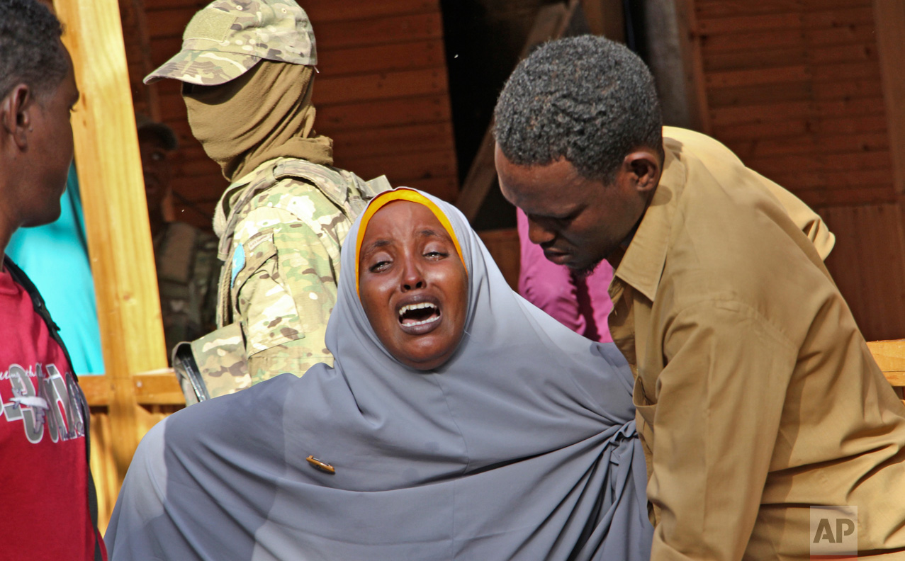  A mother whose daughter was shot in the head by attackers during a militant attack on a restaurant, grieves in Mogadishu, Somalia, on Thursday, June 15, 2017. Somalia's security forces early Thursday morning ended a night-long siege by al-Shabab Isl