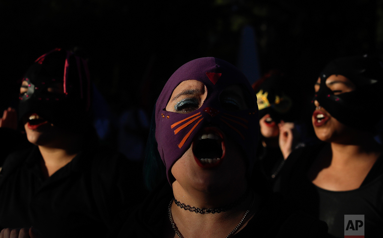  In this March 8, 2017 photo, women shout as they march on International Women's Day in Neuquen, Argentina. One in three women worldwide have experienced physical or sexual violence, according to the United Nations. In most countries, fewer than 40 p