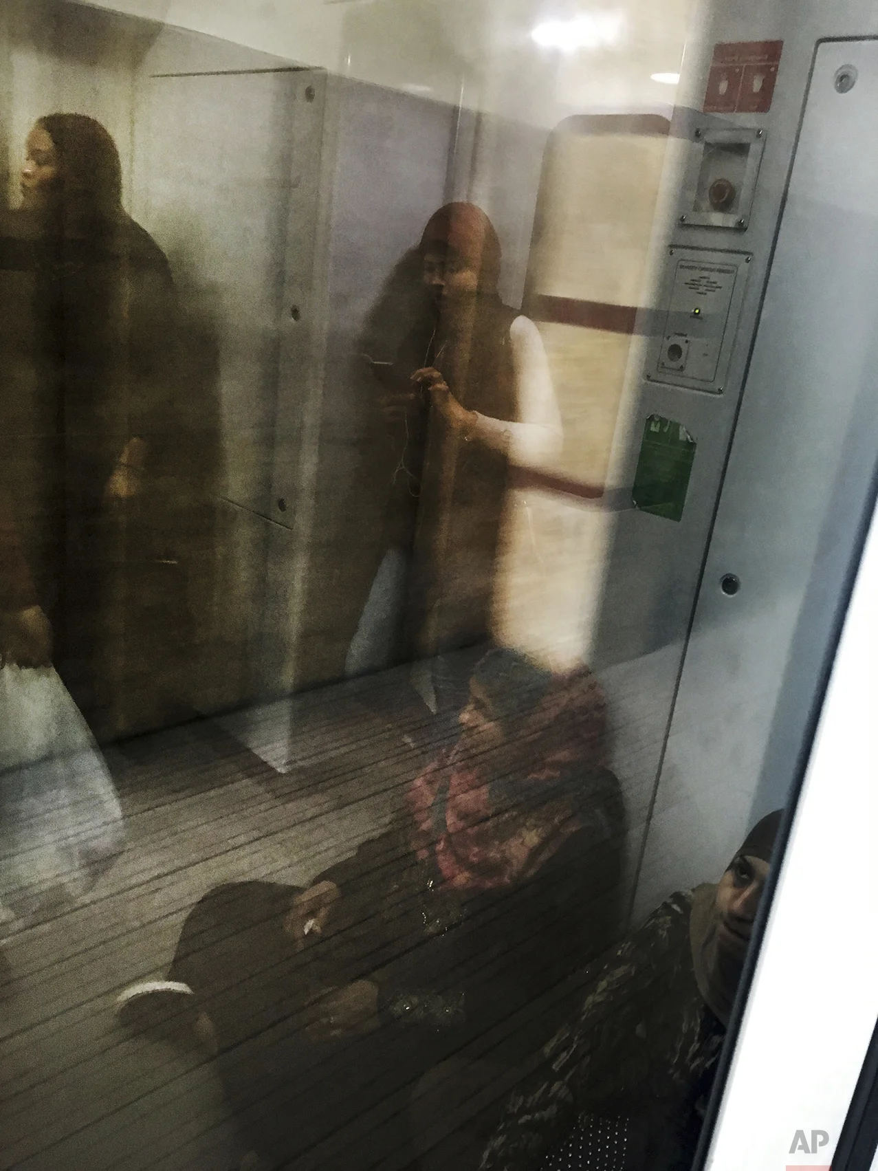 In this March 12, 2017 photo, women commute on a ladies only metro car, in Cairo, Egypt. (AP Photo/Nariman El-Mofty)