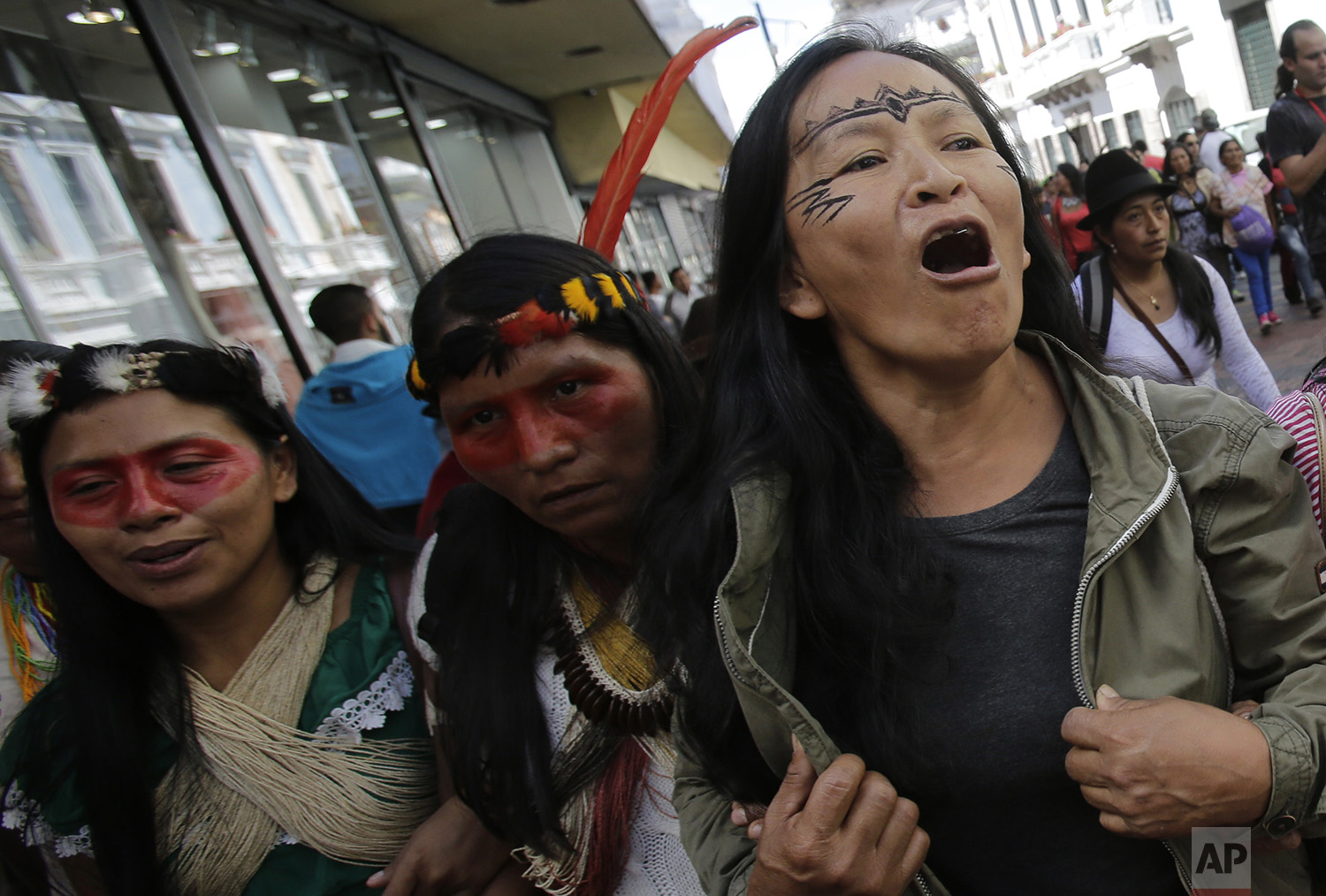 Indigenous leaders from across Ecuador march to the government palace to meet with President Lenin Moreno in Quito, Ecuador, Tuesday, July 4, 2017. (AP Photo/Dolores Ochoa)