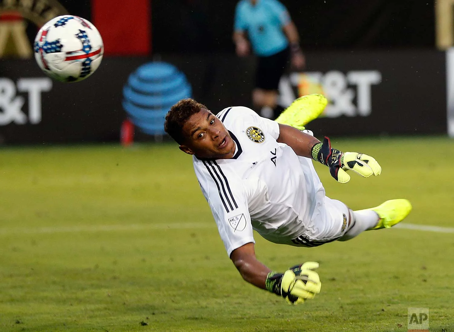 Columbus Crew goalkeeper Zack Steffen (23) blocks a shot in the second half of an MLS soccer match against Atlanta United, Saturday, June 17, 2017, in Atlanta. (AP Photo/John Bazemore)