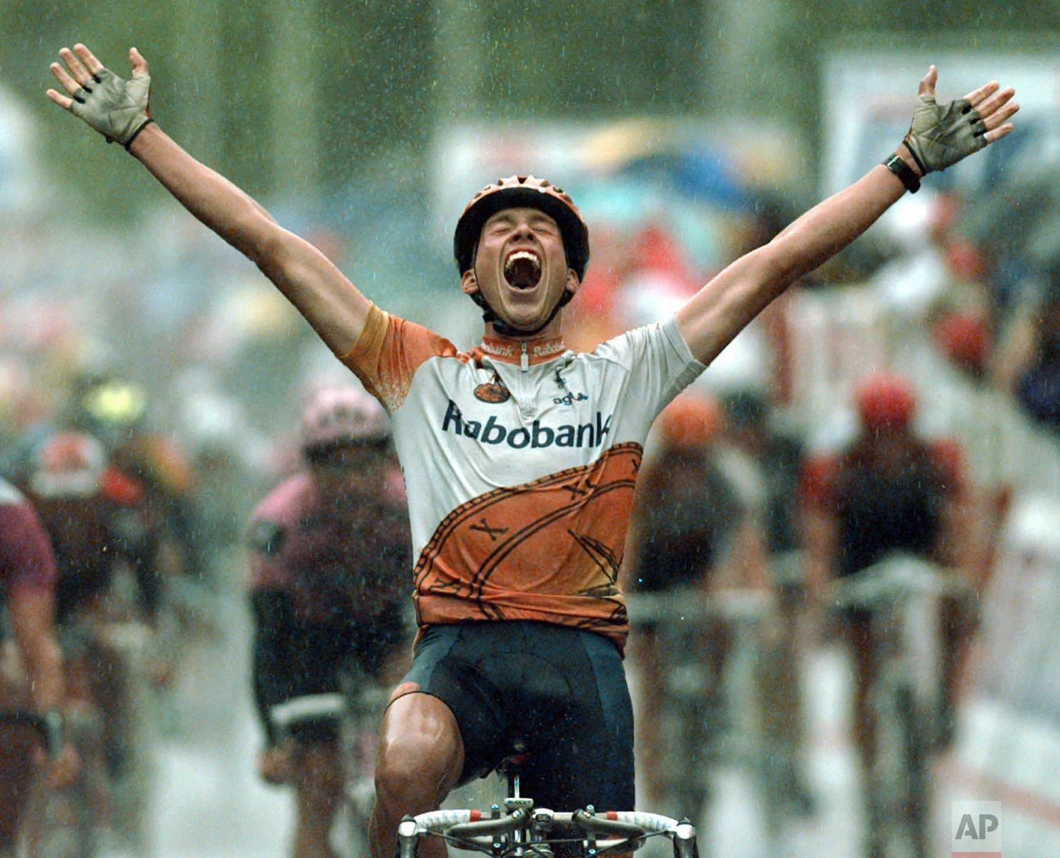 Michael Boogerd of the Netherlands reacts as he crosses the finish line to win the sixth stage of the Tour de France cycling race between Arc-et-Senans and Aix-les-Bains, eastern France Friday July 5, 1996. (AP Photo/Laurent Rebours)