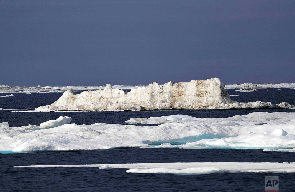  Sea ice floats past the Finnish icebreaker MSV Nordica as the ship sails through the Chukchi Sea off the coast of Alaska, Sunday, July 16, 2017, while traversing the Arctic's Northwest Passage, where global warming is melting sea ice and glaciers at