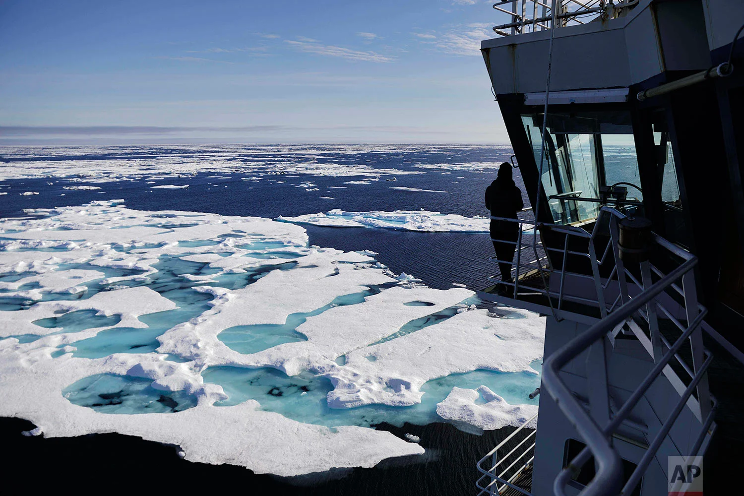The Finnish icebreaker MSV Nordica sails through ice floating on the Chukchi Sea off the coast of Alaska, Sunday, July 16, 2017, while traversing the Arctic's Northwest Passage, the treacherous, ice-bound route where Norwegian explorer Roald Amundsen made the first successful transit in 1906. (AP Photo/David Goldman)