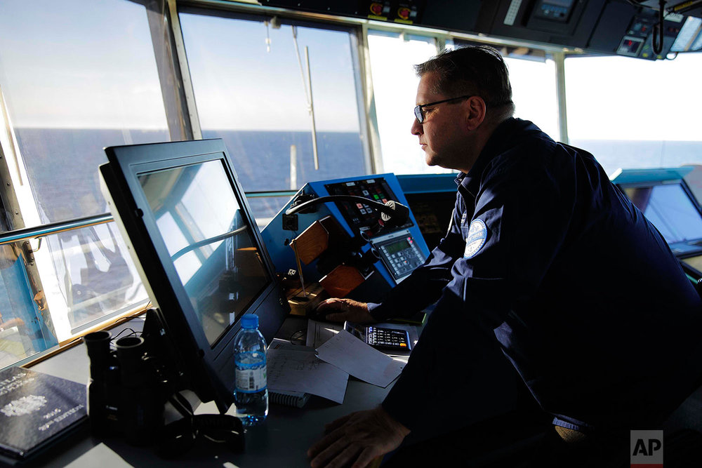  Master Mariner Jyri Viljanen, captain of the Finnish icebreaker MSV Nordica looks at a navigation screen on the ship's bridge while sailing the Dolphin and Union Strait off the coast of Canada through the Arctic's Northwest Passage, Wednesday, July 