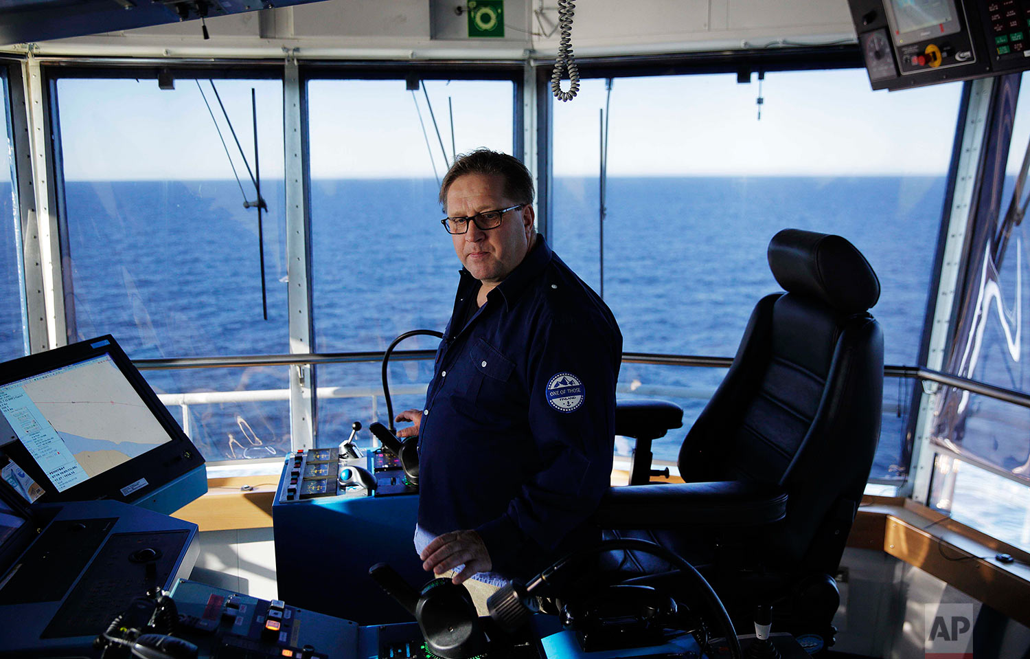  Master Mariner Jyri Viljanen, captain of the Finnish icebreaker MSV Nordica demonstrates the ship's maneuverability while sailing the Dolphin and Union Strait off the coast of Canada through the Arctic's Northwest Passage, Wednesday, July 19, 2017. 