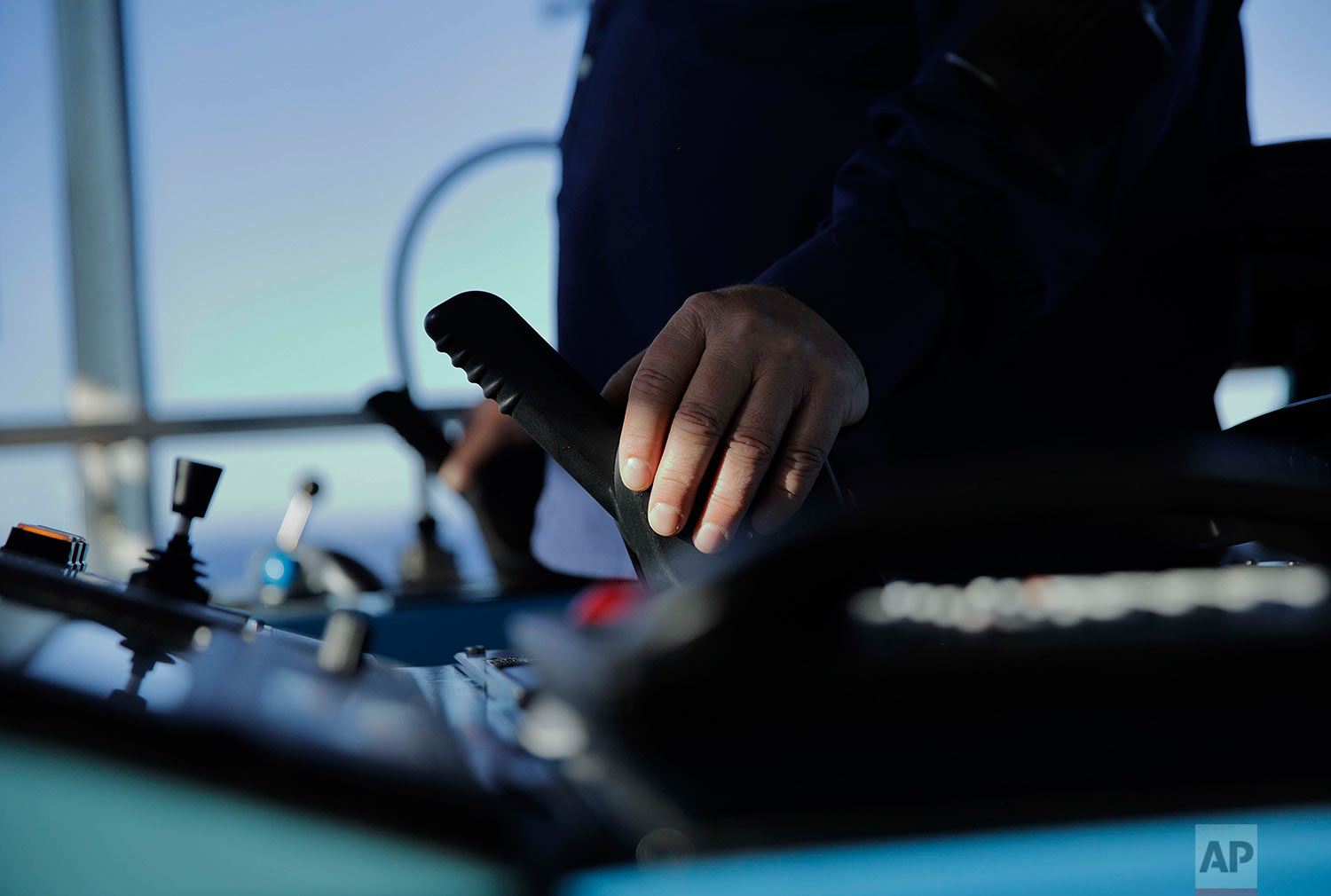  Master Mariner Jyri Viljanen, captain of the Finnish icebreaker MSV Nordica. pushes the thruster while demonstrating the ship's maneuverability while sailing the Dolphin and Union Strait off the coast of Canada through the Arctic's Northwest Passage