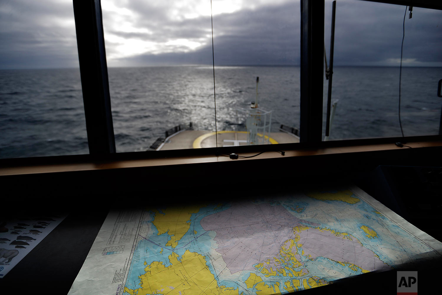  A map of the Arctic Ocean overlooks the bow of the Finnish icebreaker MSV Nordica as it sails in the North Pacific Ocean toward the Bering Sea on Sunday, July 9, 2017. While icebreakers are equipped with sensitive radar systems, ultimately it's up t