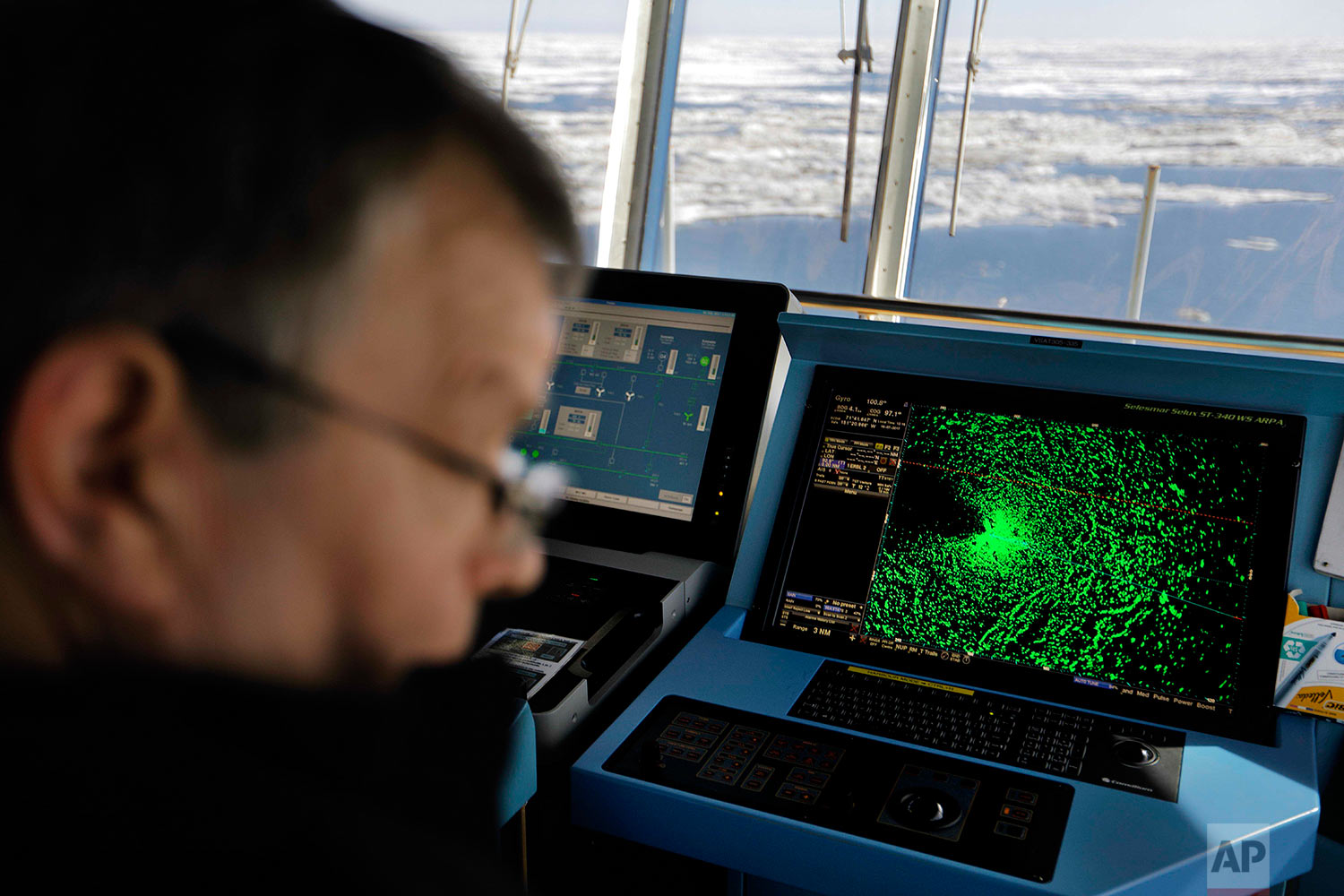  A radar shows sea ice ahead of the Finnish icebreaker MSV Nordica as chief officer Harri Venalainen navigates the ship through the Beaufort Sea while traversing the Arctic's Northwest Passage, Sunday, July 16, 2017. While icebreakers are equipped wi